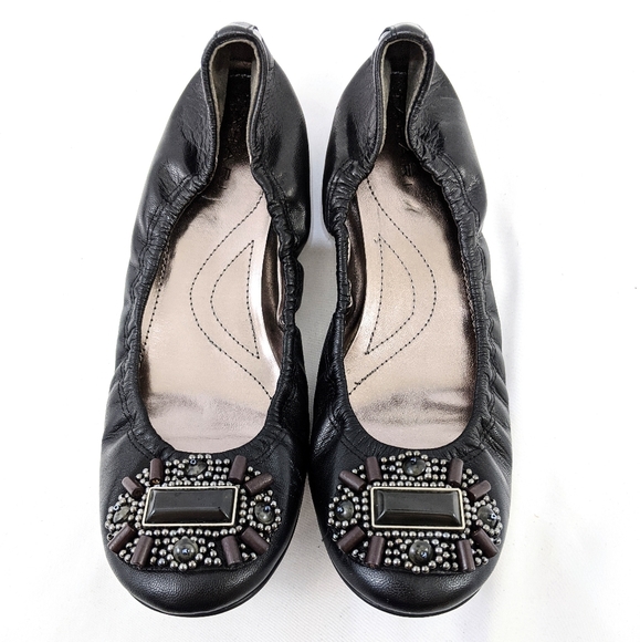 black embellished flats